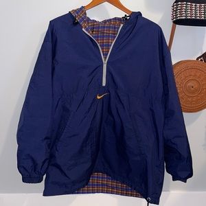 Large blue Nike windbreaker with yellow patterned insides!